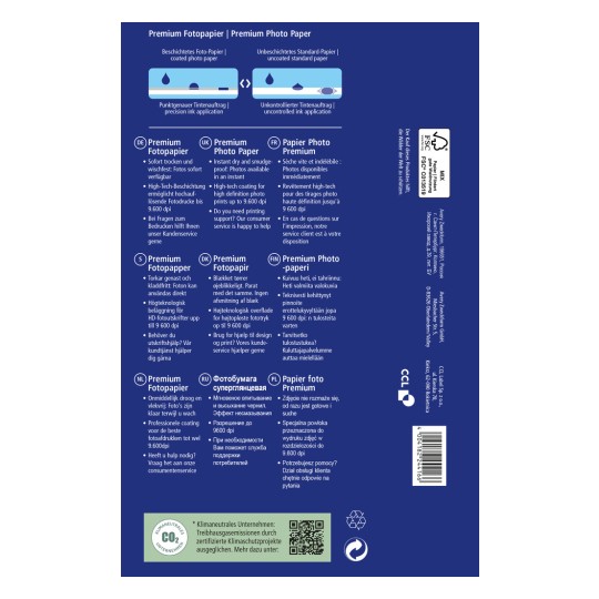 Obrázek zobrazuje balení pro prémiový fotografický papír, které podrobně popisuje jeho vlastnosti a výhody v několika jazycích. Zdůrazňuje okamžité schnutí, možnosti tisku ve vysokém rozlišení a informace o zákaznické podpoře.