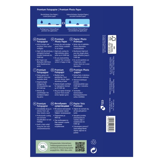 Obrázek zobrazuje balení prémiového fotografického papíru s více jazyky a informacemi o jeho kvalitě, schopnosti odolávat rozmazání a vysoce technickém povlaku pro vysoce kvalitní tisk až do 9 600 dpi.