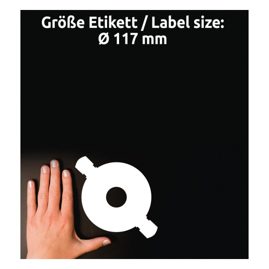 Obrázek zobrazuje ruku vedle obrysu bílého kruhového štítku na černém pozadí, s textem uvádějícím velikost štítku jako Ø 117 mm.