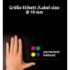 Obrázek ukazuje ruku s nataženými prsty na černém pozadí, spolu s textem, který říká 'Größe Etikett /Label size: Ø 19 mm' a čtyři barevné kruhy představující štítky v zelené, růžové, žluté a fialové barvě s poznámkou slova 'permanent haftend'.