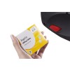 An image of a hand holding a pack of Aspirin 300mg tablets with a price tag, positioned near a scanner.