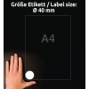 Obrázek zobrazuje papír formátu A4 s označením velikosti štítku Ø 40 mm. Ruka je umístěna vedle papíru pro názorné porovnání velikosti.